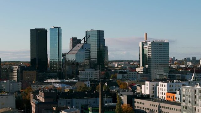 Modern City Buildings In Skyline Of Tallin In Estonia. drone pullback shot