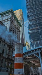 Obraz premium Urban scene with steam in NYC
