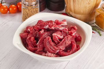 Raw beef meat - sliced strips