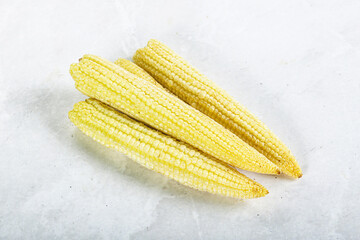 Raw sweet baby corn heap