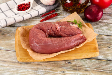 Raw pork tenderloin for cooking
