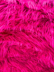 A pink fur texture with a pink background