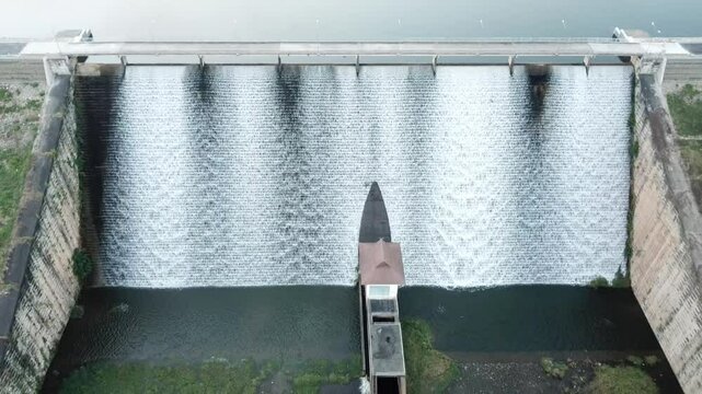 Aerial view of Mae Suai reservoir (or Dammed valleys) located at a narrow part of a valley downstream of a natural basin in Mae Suai district of Chiang Rai province of Thailand.