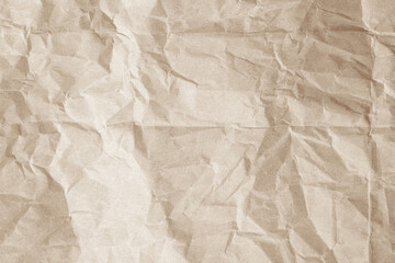 Crumpled brown paper texture background for design with copy space for text or image.