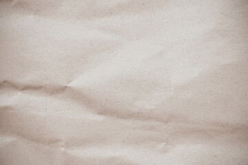 Crumpled brown paper texture background for design with copy space for text or image.