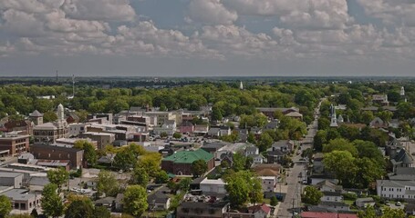 Georgetown Kentucky Aerial v1 low flyover residential area capturing quaint town center with a blend of historical architecture and greenery under cloudy sky - Shot with Inspire 3 8k - Sept 21st 2023