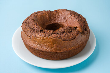 Top view of cocoa, walnut, chocolate carrot and cinnamon bundt cake