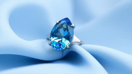 Vibrant Blue Topaz Pear Ring on Silk