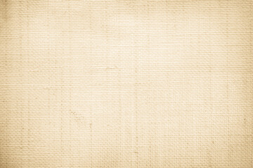 Closeup detail of beige fabric texture background. High resolution photo.