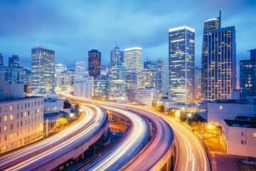 Fototapeta premium City skyline at dusk with busy traffic in urban landscape