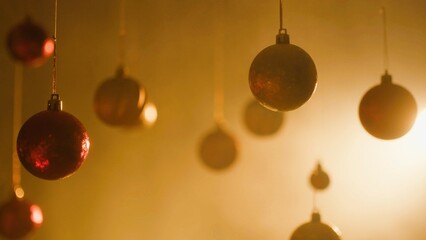 Christmas balls arranged as Newton's cradle defocusing decorated Christmas tree ,Merry Christmas , Happy Holidays