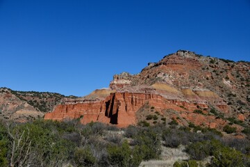 Fototapeta premium Lighthouse rock formation on the Paseo del Rio trails in Palo Duro Canyon State Park, Texas