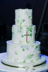 Elegant wedding cake with floral design.