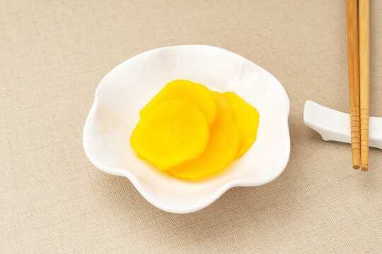 Danmuji, yellow pickled radish, traditional Korean Food
