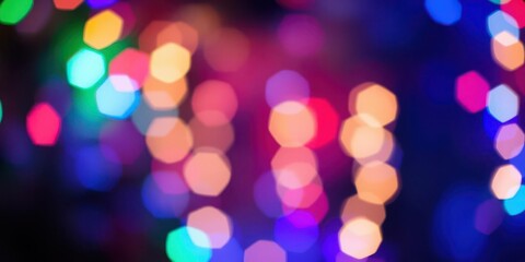 Blurred Christmas holidays lights creating colorful bokeh effect, celebration, decoration