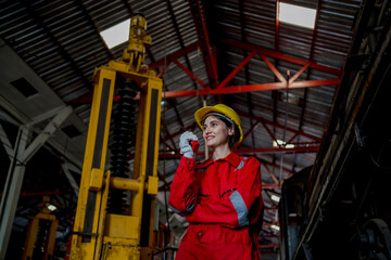 Engineer checking construction process railway and checking work on railroad station . Railway engineer checking machines in train station. Train engineer concept