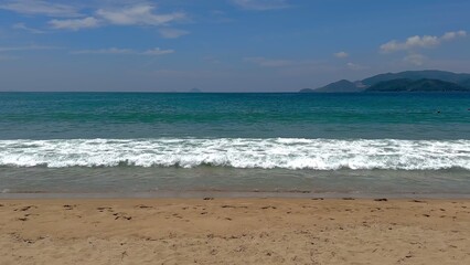 Enjoy the beautiful beach featuring clear waves and a lovely sandy shore during your visit