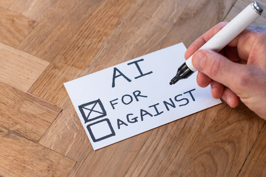 human hand with pen casts positive vote on popular trending topic AI Artificial Intelligence. Public opinion varies on computer automation and ethics. people embrace modern technology 