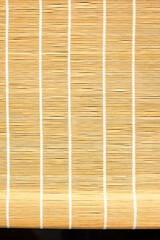 Hand woven straw roller shade abstract pattern. Bamboo blinds pattern Diagonal texture background. Bamboo blind frame with rope