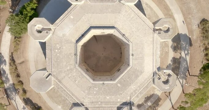Aerial perpendicular view of Castel del Monte. It is a castle situated on a hill near Andria in the Apulia region, Italy. It is a fortress built in the Middle Ages and famous for its octagonal plan.