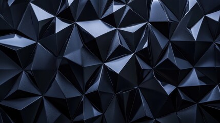 Fototapeta premium An abstract geometric surface featuring sharp, angular facets in deep shades of black.