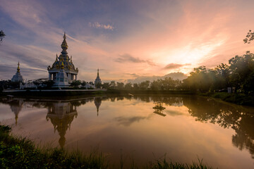 Fototapeta premium The background of an important tourist attraction in Khon Kaen Province (Wat Thung Setthi) is a large pagoda in the middle of a swamp, tourists always come to see the beauty in Thailand