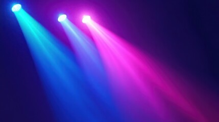 Three spotlights with blue and pink light beams shining on a dark background.