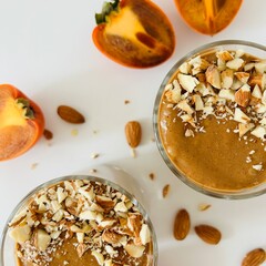 Tasty Chocolate Persimmon Pudding Garnished with Crushed Nuts