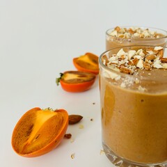 Tasty Chocolate Persimmon Pudding Garnished with Crushed Nuts