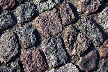 a stone texture, grey stones on the floor