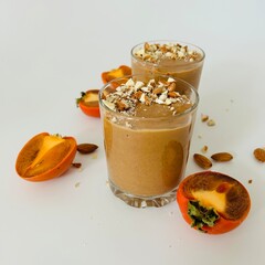 Tasty Chocolate Persimmon Pudding Garnished with Crushed Nuts