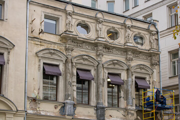 Reconstruction of a historically valuable old mansion with beautiful intricate stucco work on the facade