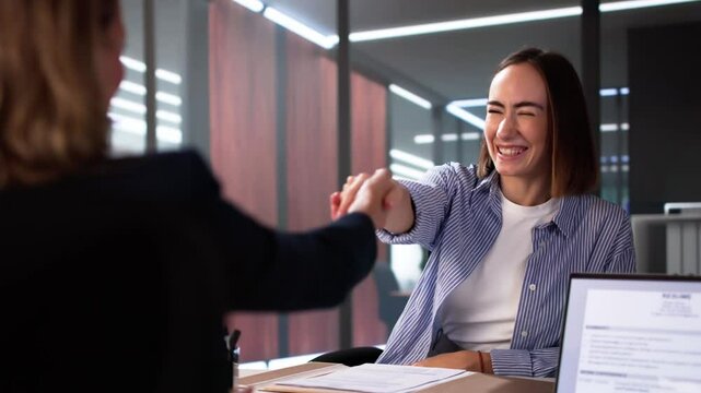 Young Woman Sitting At Interview