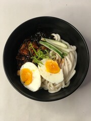 A typical Korean food is jjajangmyeon