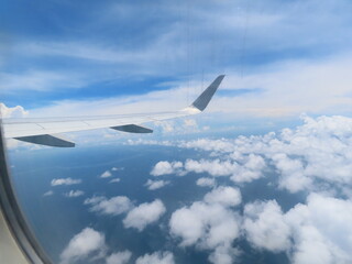 Fototapeta premium ​view out the window from inside the plane about to take off