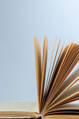 open book on pile of books background shcool study book. The concept of reading literature,...