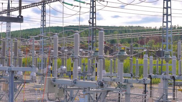 Drone view of electricity substation with distribution lines and infrastructure
