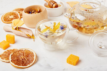 Natural tea time, herbal tea with natural honey and dry mango close up. Natural organic tea - natural sustainable eco-friendly lifestyle. herbal harmony - mountainous serenity in tea rituals