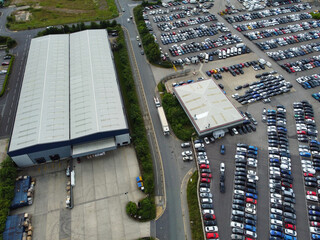 High Angle View of Industrial Estate and Warehouses at Leeds City of United Kingdom. Aerial Footage Was Captured with Drone's Camera on June 12th, 2024 from Medium High Altitude.
