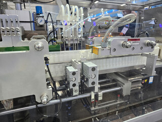 Blister packing machine. Filling and sealing machine. Food and pharmaceutical industry