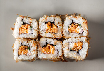 Sushi rolls. Japanese food in restaurant. Sushi roll set with salmon, vegetables and rice. Asian food concept. Japanese cuisine.