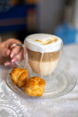 Caf Latte with chocolate chips and eclairs.
