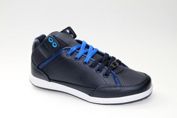 Men's sneakers. White background. Side view Unbranded shoes.
