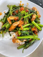 Rice topped with stir-fried pork and basil, Rice topped with stir fried minced pork and basil with Fried egg