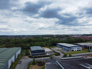 High Angle View of Industrial Estate and Warehouses at Leeds City of United Kingdom. Aerial Footage Was Captured with Drone's Camera on June 12th, 2024 from Medium High Altitude.