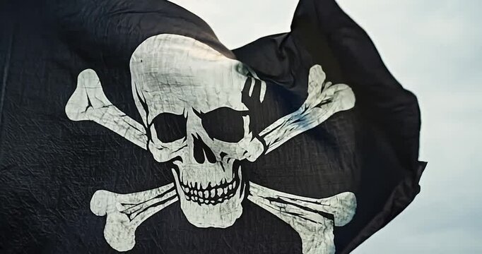 a distressed pirate flag with a skull and crossbones, isolated against a plain background