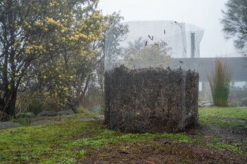 compost ring making compost pile on a farm holding microorganisms storing carbon sustainable...