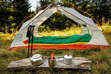 Equipment for camping and cooking on a mountain hike.