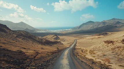 Naklejka premium Scenic Desert Road with Coastal View