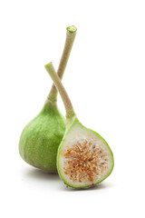 Close-up of whole and sliced organic green figs (Ficus carica, or Anjeer), isolated on a white background. Front view.